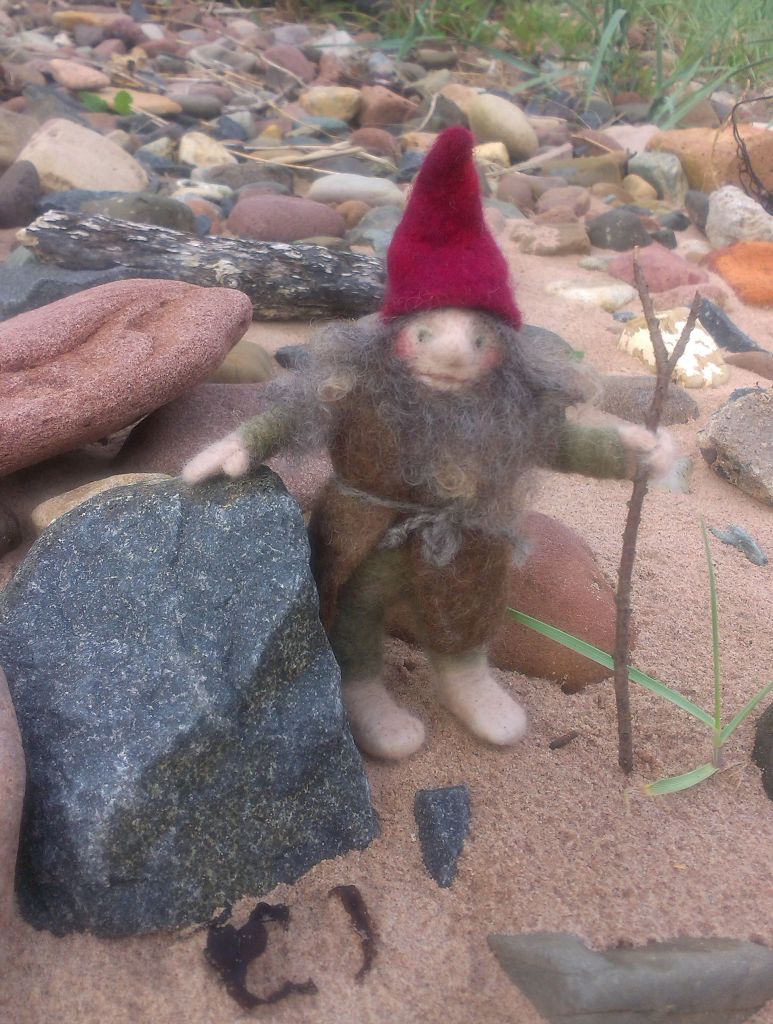 Hiking gnome with a walking stick