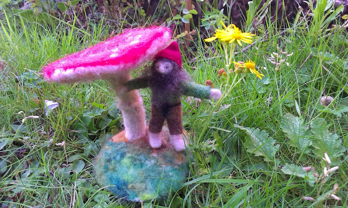 Little dwarf with toadstool