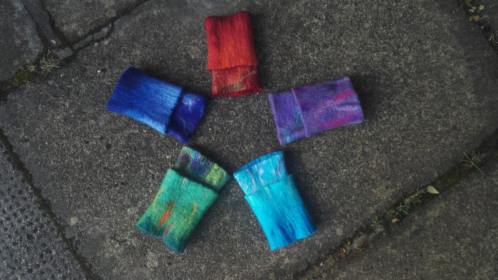 Wet felted wrist cuffs