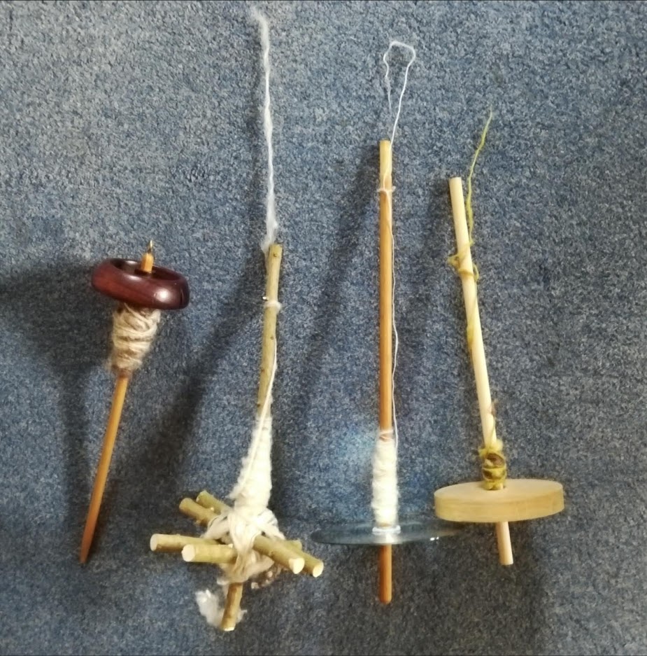 Four different drop spindles, two of them I have made myself