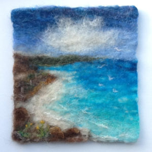 Wet felted eascape with needle felted embellishment