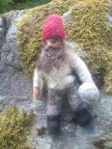 Stone dwarf on a rock                